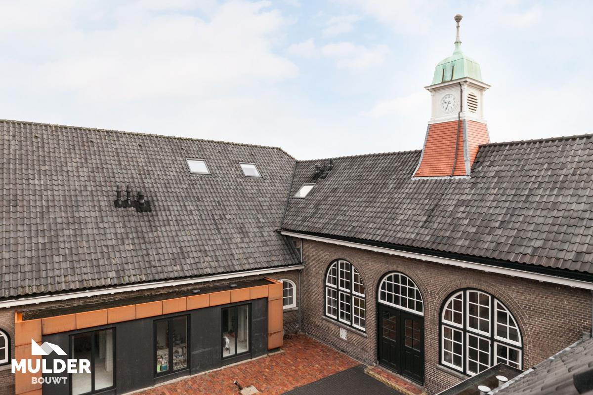Van schoolgebouw naar 4 woningen