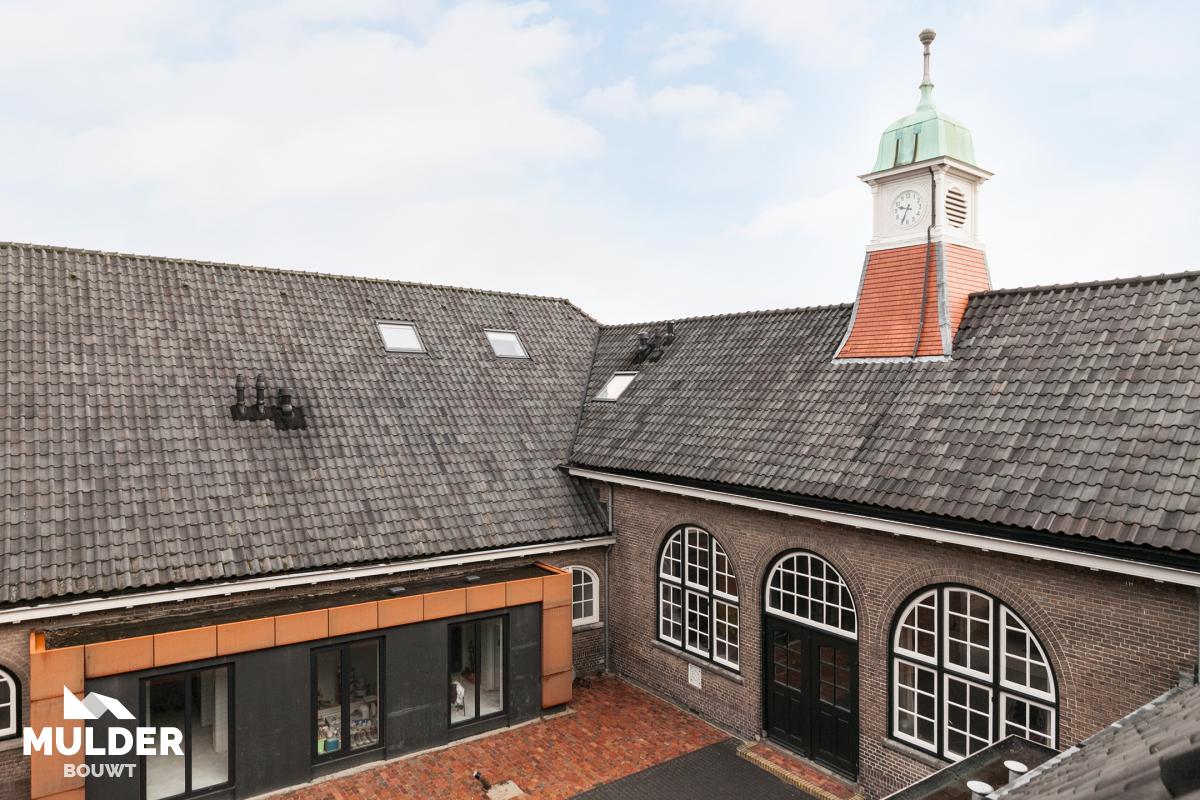 Van school- naar woongebouw