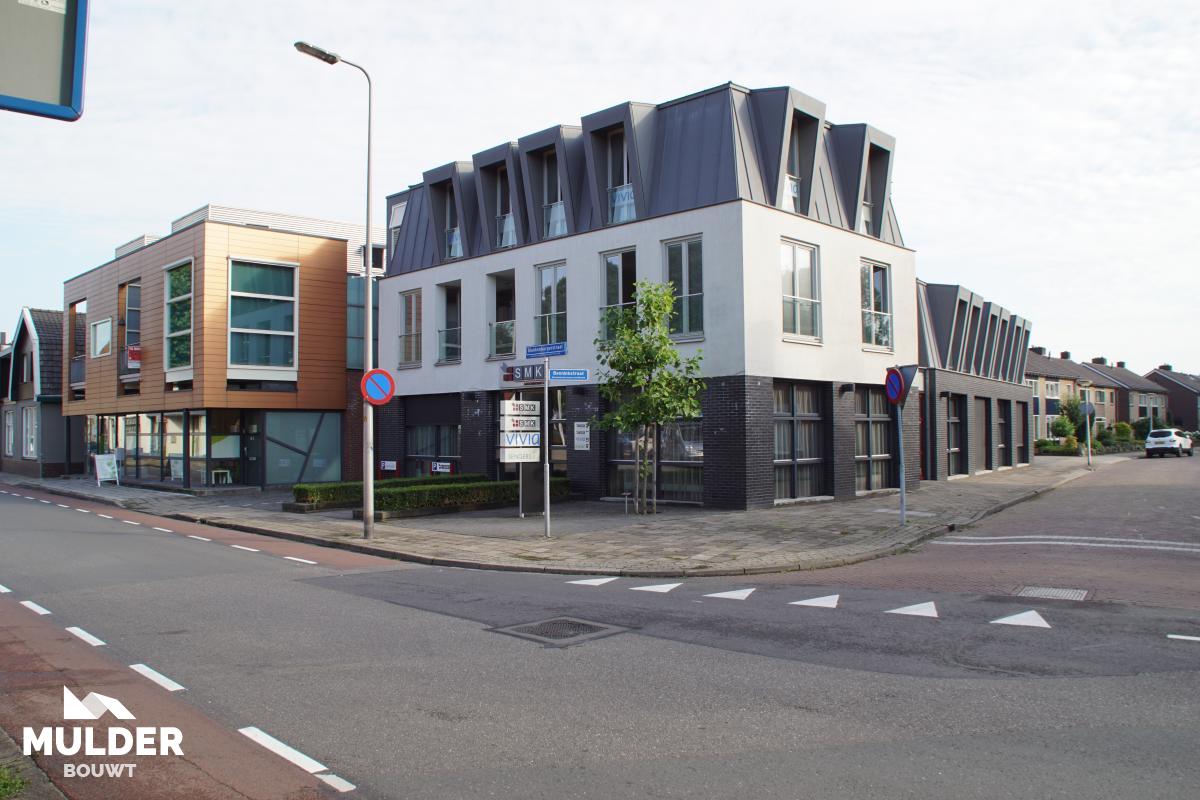 Kantoorpand met appartementen