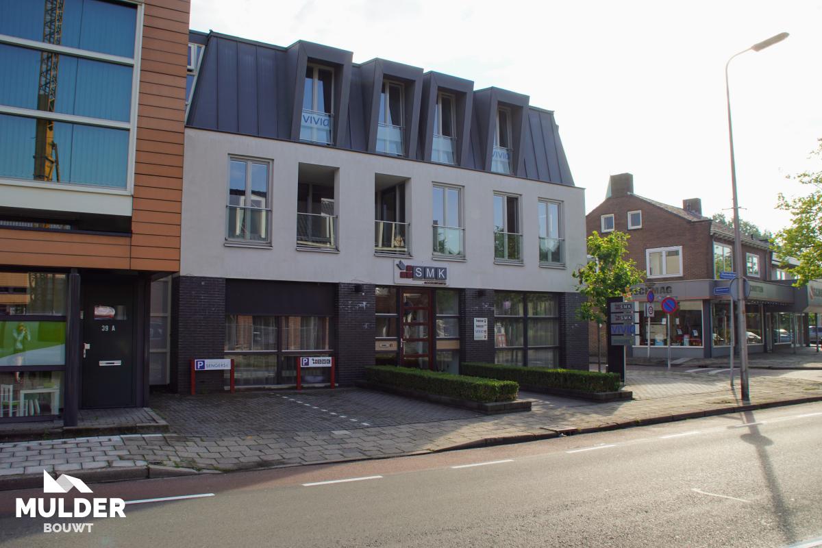 Kantoorpand met appartementen