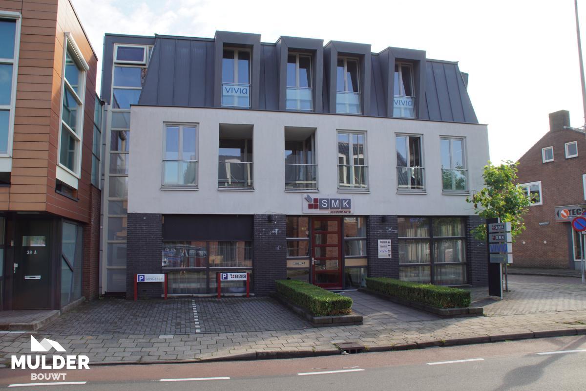 Kantoorpand met appartementen