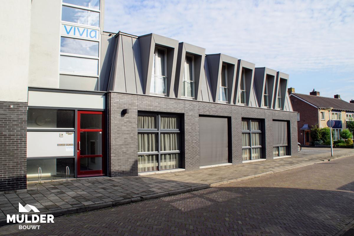 Kantoorpand met appartementen